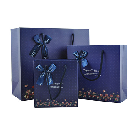 Paper bag with ribbon